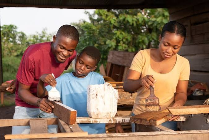 A family building and painting together
